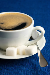 Cup of coffee and sugar