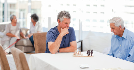 Seniors playing chess