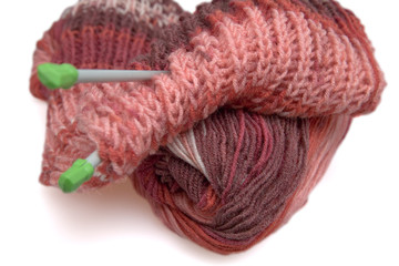 knitted scarf of claret color on a white background
