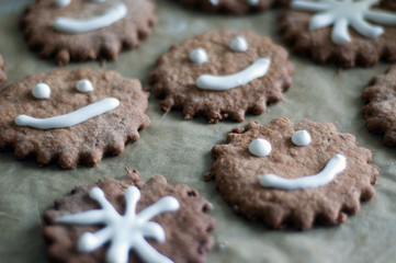 Homemade gingerbread cookies on the paper