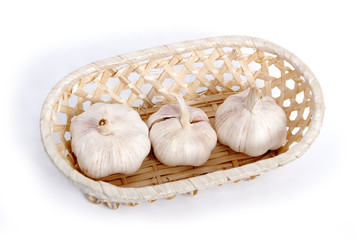 Garlics in basket.