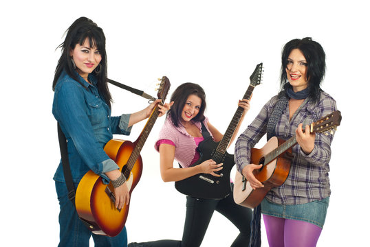 Attractive three women with guitars
