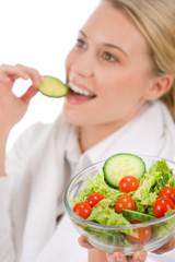 Healthy lifestyle - woman with vegetable salad