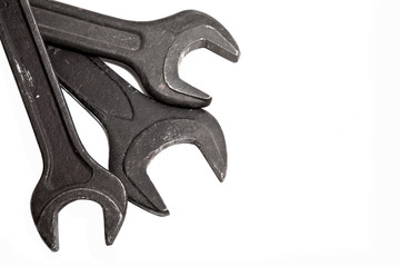 Old wrenches for repair on a white background