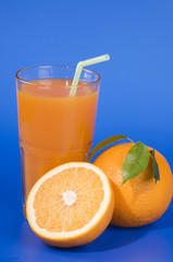 Orange food and drink over blue background