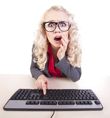 Shocked girl at a computer