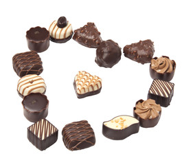Heart of chocolates, isolated on a white background