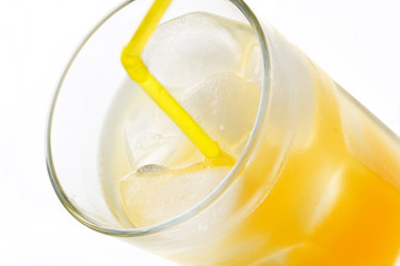 glass of orange juice with ice