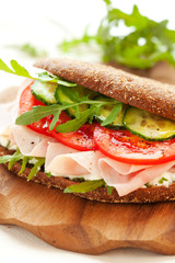 Sandwich with ham and vegetables