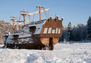 Vintage sail ship stern snow covered on a sunny day