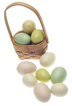 Speckled Easter Eggs in a Basket Isolated