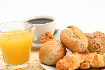 Breakfast with orange juice, coffee and backery