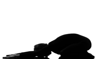 woman adho mukha virasana child pose yoga