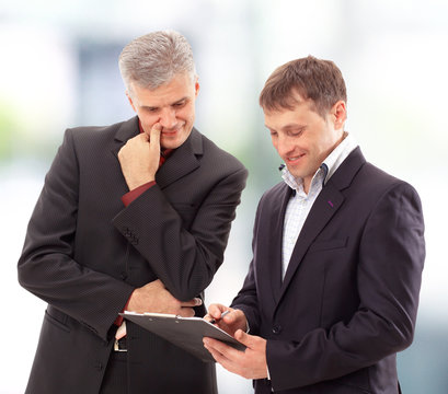 Two businessmen discussing - Isolated studio picture in