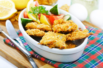 Fish rolled in almond and fried