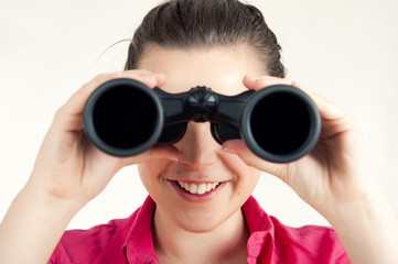 young woman with binoculars