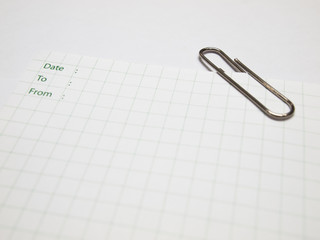 white paper note with table