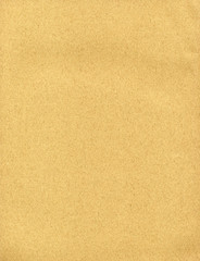 Fototapeta na wymiar Brown cardboard sheet useful as a background