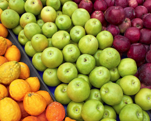 apples and bergamots at the local market, natural background