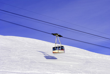 cable car in the winter to transport skiers in the Italian Alps