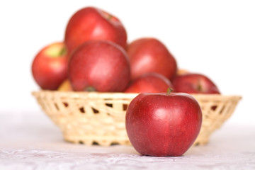 Fototapeta na wymiar Wood basket with Red Apples