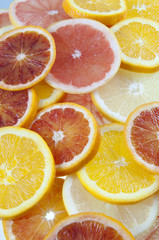 Naklejka na ściany i meble portion of sliced citrus