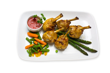 chicken legs with asparagus and ketchup