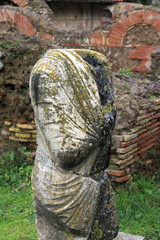 torso of ancient statue in Ostia Antica