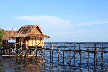 wooden house beside the sea