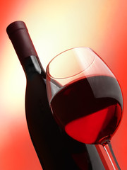 Red wine on the black background