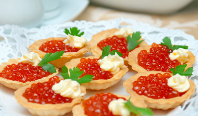 Tartlet with red caviar   .
