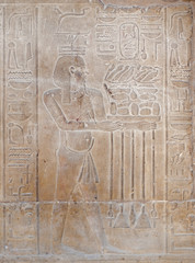Hieroglyphic carvings on a wall at Luxor Temple