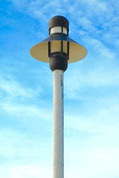 Lantern in the beach with blue sky