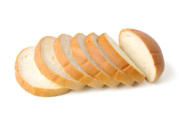 The cut loaf of bread isolated on white