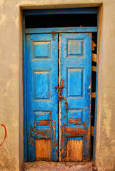 worn down blue door