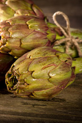 Obraz premium bunch of artichoke on wood background