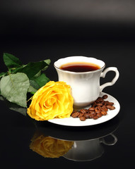 Coffee and yellow rose