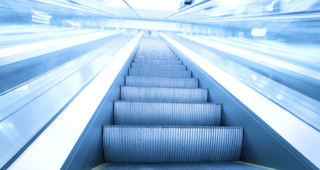 steps of escalator in business center