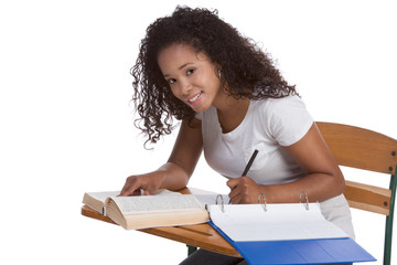 High school schoolgirl student with by desk studying