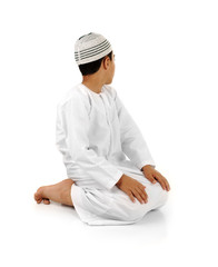 Arabic child showing complete Muslim praying, salat