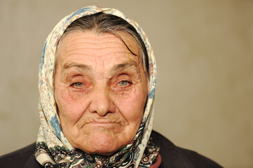 Closeup portrait of elderly serious woman