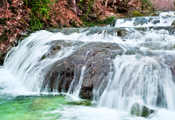 Winter waterfalls in mountains.