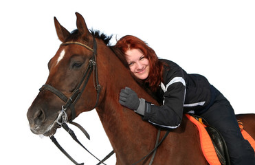 Smiling girl on a horseback
