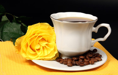 Coffee and yellow rose