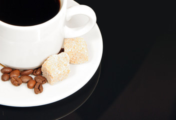The cup of coffee and beans