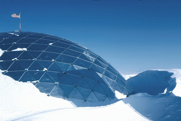 thirty foot snow drifts around the dome at the south pole - Powered by Adobe