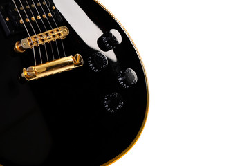 Black electric guitar close-up - art musical background