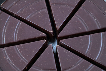 Closeup shot of dark chocolate wedges  in can