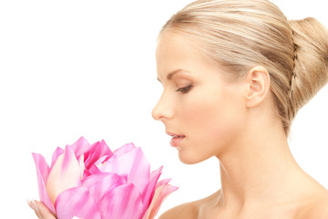 Fototapeta premium beautiful woman with white flower