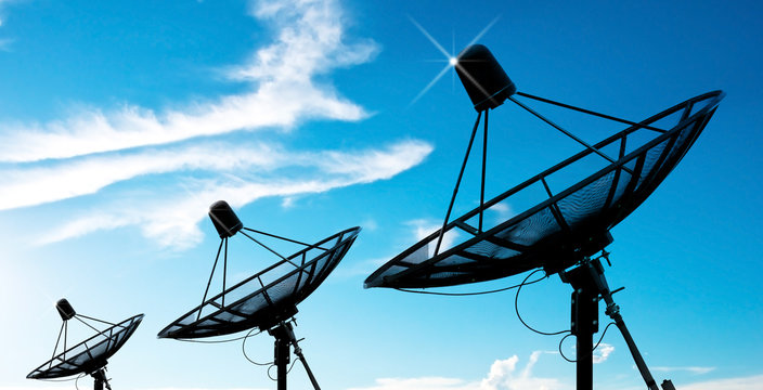 satellite dish antennas under sky